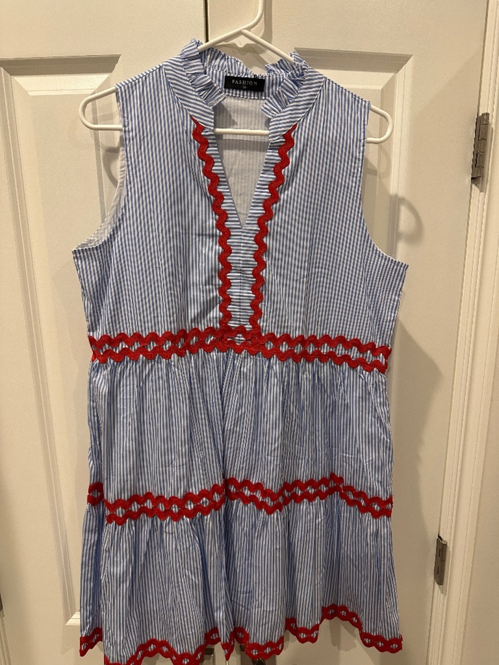 Blue/White Sleeveless tiered striped dress with red rim rack trim